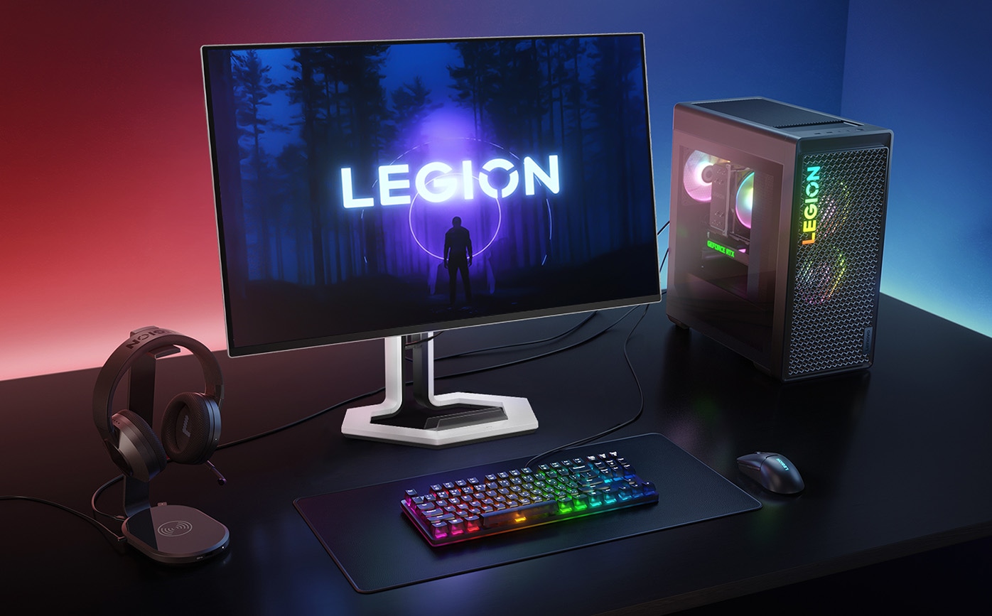 An legion ecosystem shot with Legion Pro monitor in the middle, Legion Tower, keyboard, mouse and headphone on the side.