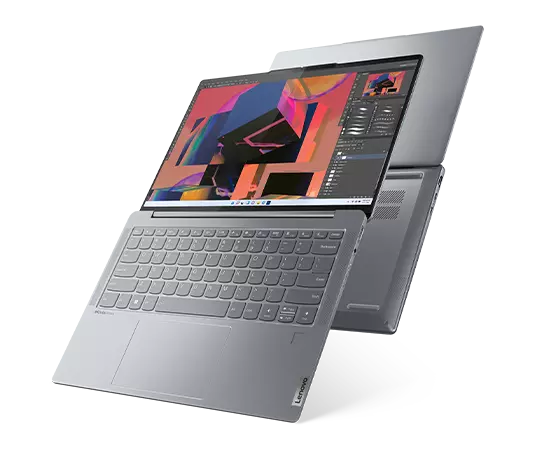 2 Lenovo Slim 7i 14-inch Misty Gray laptops open 180° one facing front and covering the back of the second laptop