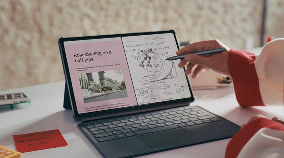 Student using Lenovo Idea Tab Pro in a split-screen mode to take notes and view study materials simulatnously with Lenovo Tab Pen Plus.