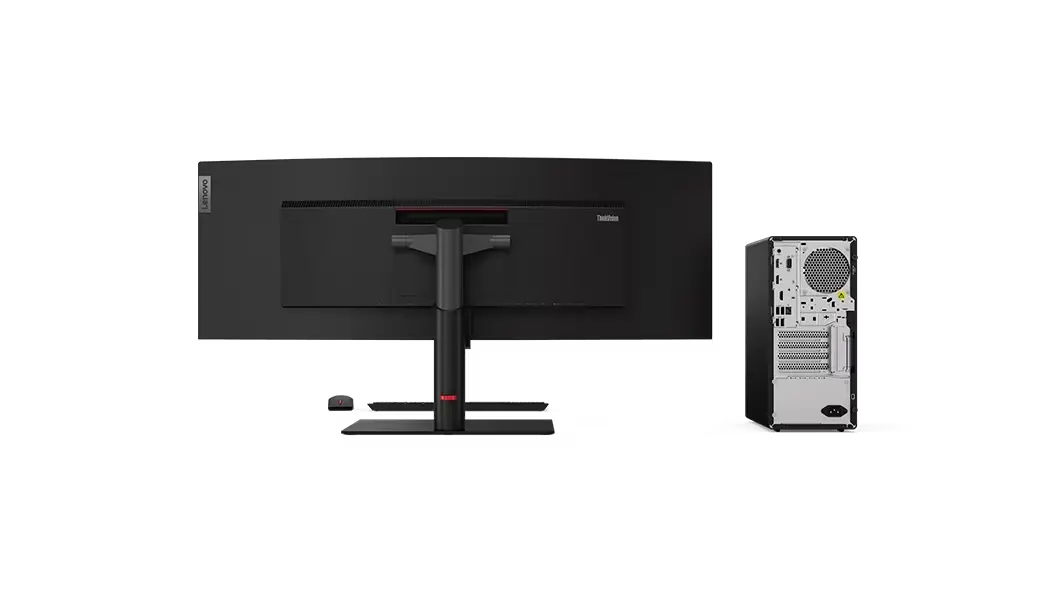 Rear view of the ThinkCenter M90t tower desktop on the right with monitor, keyboard, and mouse