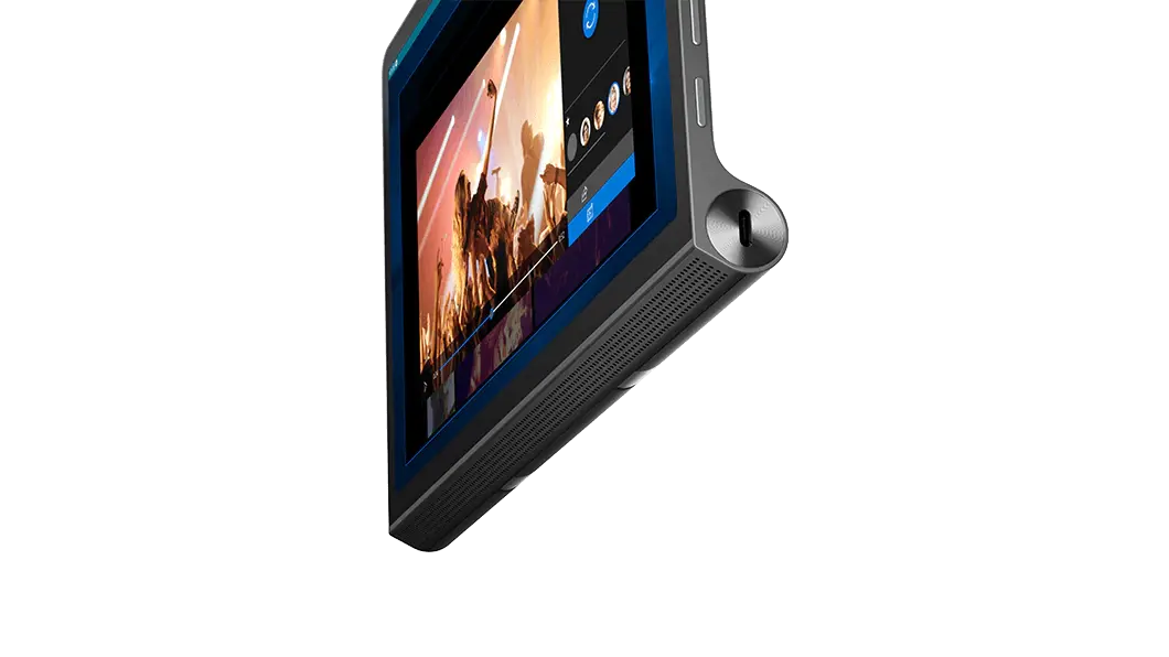 Tablet Lenovo Yoga Tab 11: vista recortada del lateral derecho, inferior y frontal, enfocada en los altavoces, con reproductor de música e imagen de un concierto en la pantalla