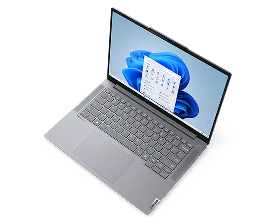 Aerial view of Lenovo ThinkBook 14 Gen 6+ (14 inch Intel) laptop, opened at slight angle, showing 14 inch display, keyboard & trackpad