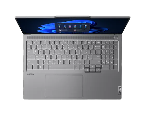 Top view of the Lenovo ThinkBook 16p Gen 5 (16” Intel) laptop with lid opened at a wide angle, a Windows 11menu displayed on screen, & a clear view of its keyboard.