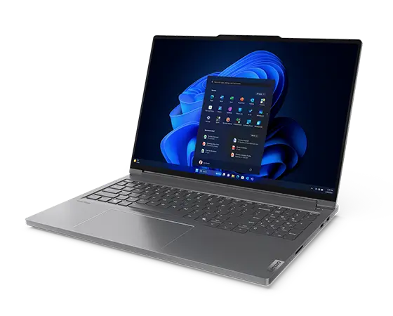 Front, right side view of the Lenovo ThinkBook 16p Gen 5 (16” Intel) laptop with lid opened at a wide angle, focusing keyboard & a Windows 11 Pro menu displayed on the screen.