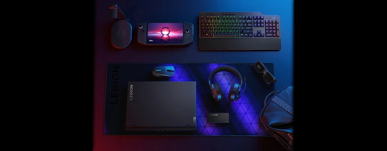 Legion Pro 7i Gen 9 on a table with several Legion gaming accessories