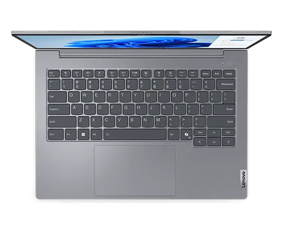 Close up, top view of Lenovo ThinkBook 14 Gen 7 (14'' Intel) laptop opened at 90 degrees, majorly focusing on its redesigned keyboard.