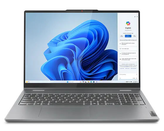 Close-up, front view of the Lenovo IdeaPad 5 2-in-1 Gen 9 (16 inch AMD) laptop in Luna Grey with lid opened at 90 degrees, focusing its keyboard & display with Windows Copilot menu opened on the screen.