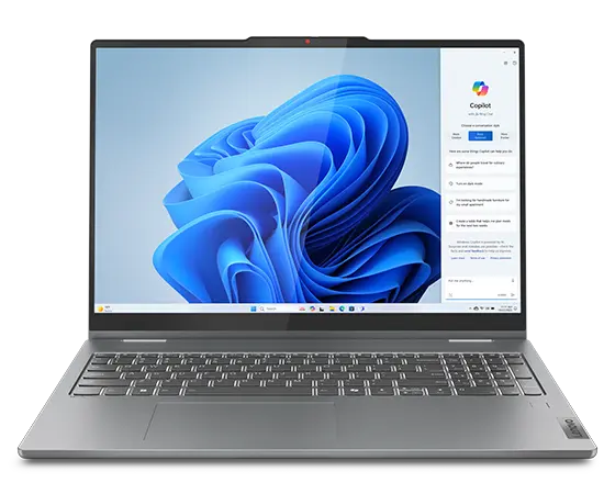 Gros plan du portable Lenovo IdeaPad 5 2 en 1 Gen 9 (16 pouces AMD) en grisuna avec couvercle ouvert à 90 degrés, mettant en évidence son clavier et son écran avec menu Windows Copilot ouvert à l’écran.