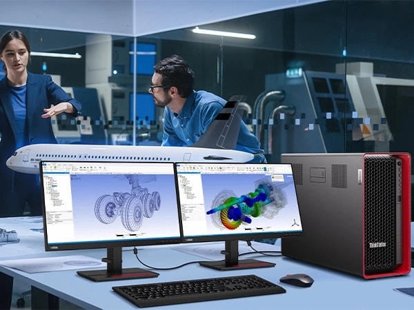 Two monitors showing aeroplane wheel designs, alongside Lenovo ThinkStation P7 workstation, with two engineers in the background