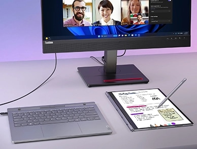 Image showing multiple uses of Lenovo ThinkBook Plus Gen 5 Hybrid (14” Intel) laptop with its Station linked to an external monitor for video calling & the Tablet used to create notes with Lenovo Tab Pen Plus.