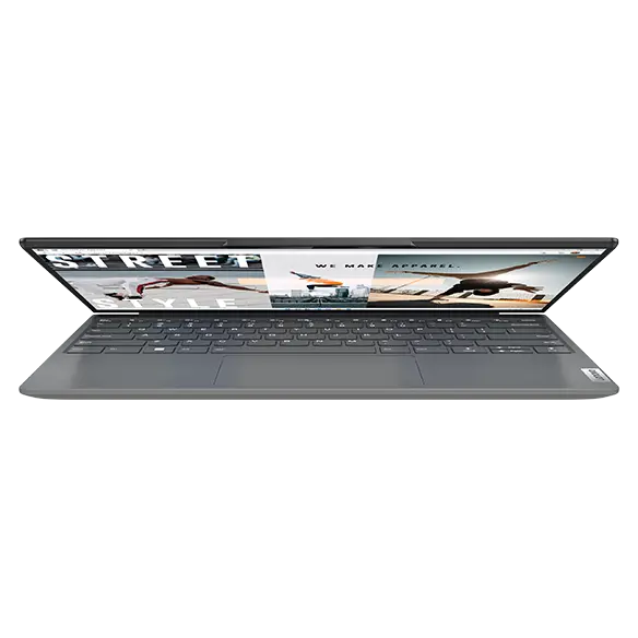 Yoga Slim 7i Carbon Gen 7 front facing, partially closed, Windows 11 on screen