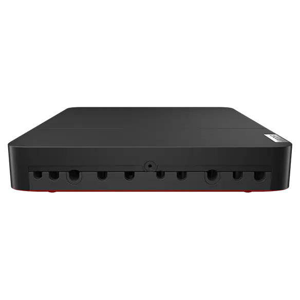 Overhead shot of Lenovo ThinkSmart Core computing device showing cable-management with closed cover on ports.