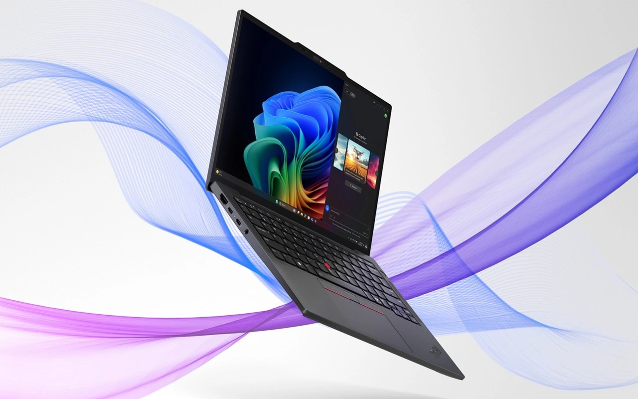 Left angle view of the ThinkPad X13 Gen 6 (13” AMD) surrounded by blue and purple ribbons. 