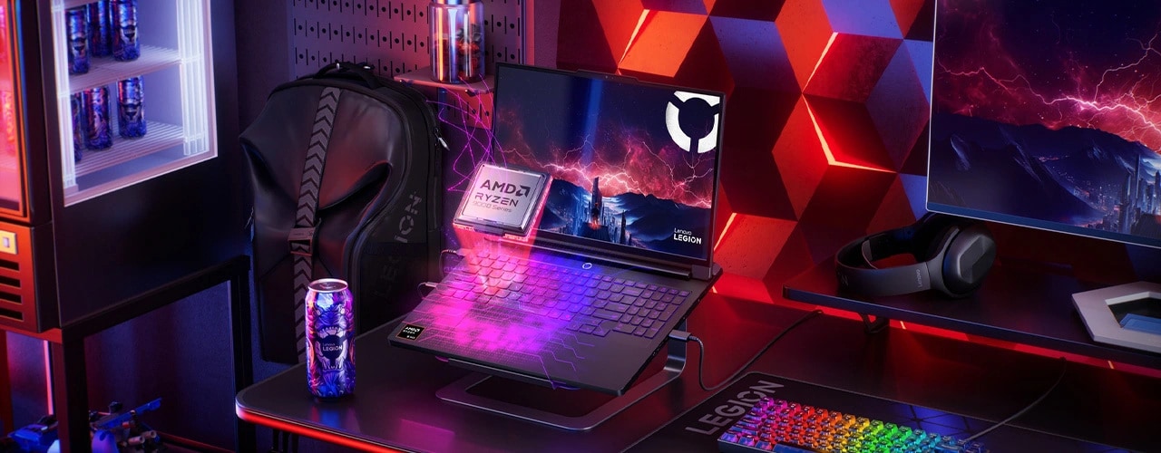 The AMD Ryzen processor emerges from the Lenovo Legion Pro 7 Gen 10 (16” AMD), against a background that includes a mini-fridge, keyboard, headphones, and monitor. מחשב נייד Legion Pro 7 16AFR10H 83RU001RIV מבית Lenovo