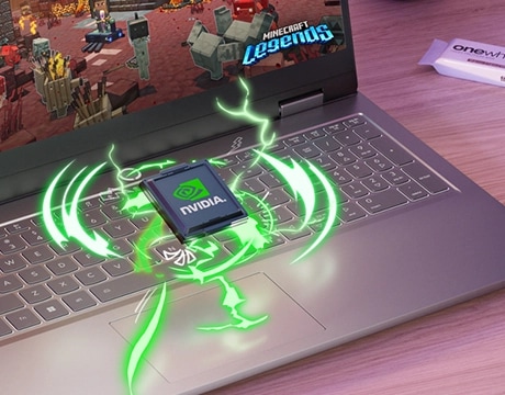 Closeup of keyboard and partial display of a Lenovo LOQ Essential 15IRX11 gaming laptop on a desk – with Minecraft Legends on the screen on the display and a NVIDIA GPU chip appearing to rise out of the keyboard.