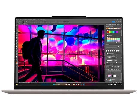 Lenovo Yoga Slim 7i Ultra Gen 11 Aura Edition 14 Front view of the Lenovo Yoga Slim 7i Ultra Gen 11 Aura Edition (14” Intel) with a figure walking in front of a colorful background on the display.