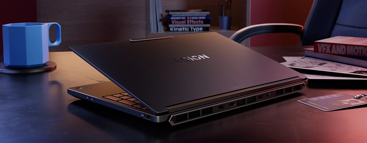 Lenovo Legion 5 5YMJ | 15.3" WQXGA 165Hz | AMD Ryzen AI 7 450 |16GB DDR5 | 1TB SSD | 5050 8GB | 440 AI TOPS 15 Rear ports and wide vents shown on a partially closed gaming laptop, Lenovo Legion 5a Gen 11 (15" AMD).