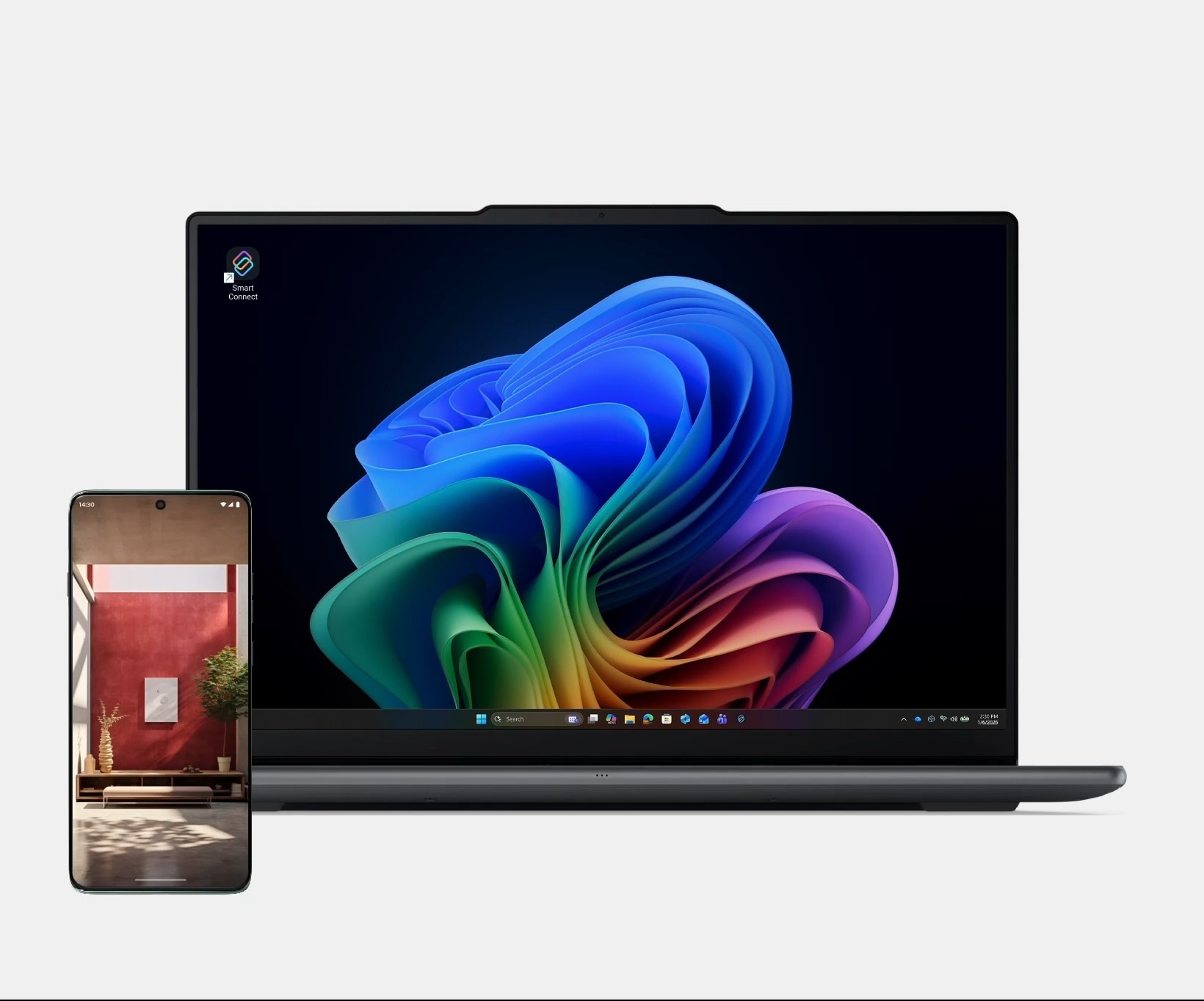 A user turns a Motorola smartphone to share a photo to a Lenovo Yoga laptop using Smart Connect.