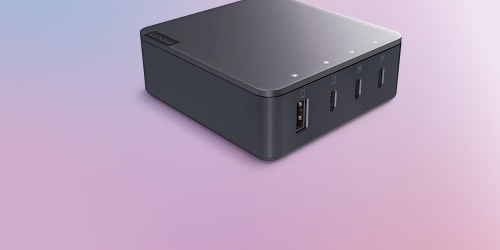  A Lenovo Go 130W Multi-Port Charger is featured on a light background.