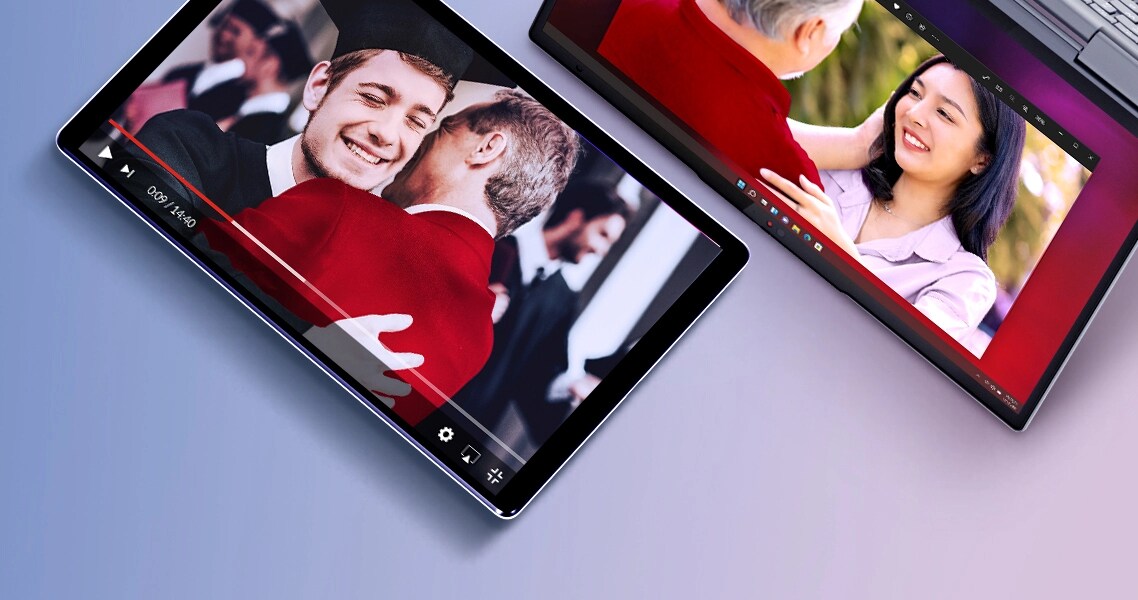 A laptop open 180° degrees showing a young father with his child, a tablet showing a video of a father hugging his son  during his graduation and a yoga laptop showing a father and her young daughter.