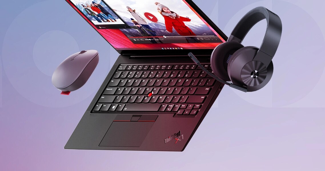 A Lenovo Thinkpad, mouse and headset floating in the air