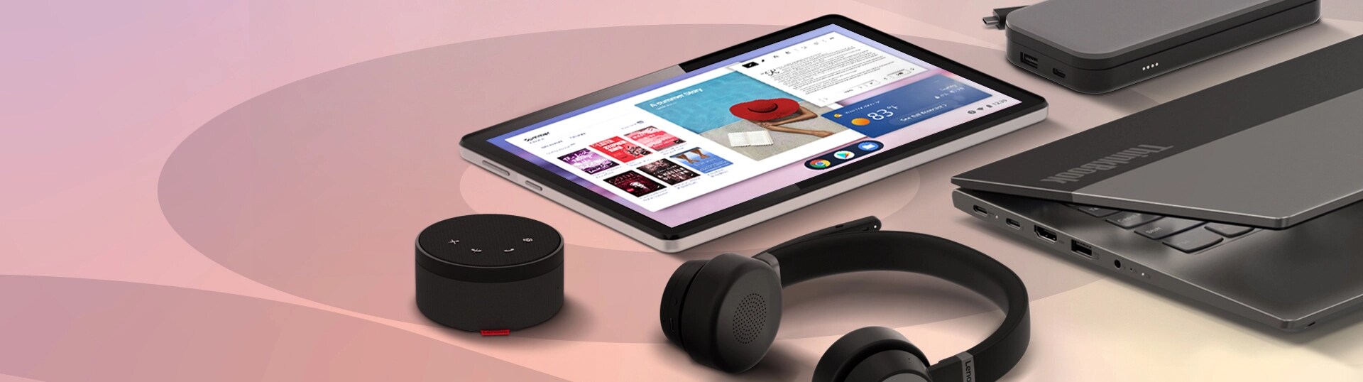 A Lenovo speaker, tablet, headphone, power bank and ThinkBook laptop