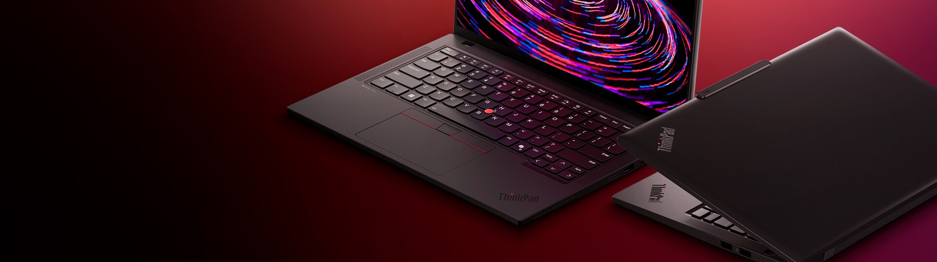 Lenovo ThinkPad T14 Gen 5 and T14s Gen 6 laptops displayed on a desk, highlighting sleek design and professional performance.