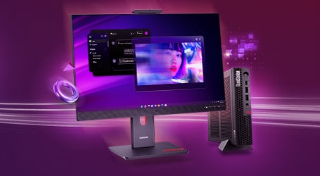 An all in one PC with a purple-pink glow displaying user profile thumbnails, beside a black ThinkCentre desktop tower and accessories
