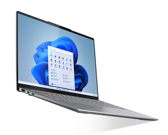 Lenovo Slim 7i 14-inch Misty Gray open facing to the right with Windows 11 menu open