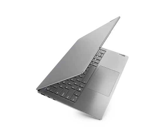 A Lenovo Slim 7i  laptop with a grey color scheme and shown in an open position.