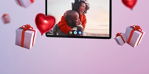 Floating Lenovo Tablet, heart shaped balloons, and present