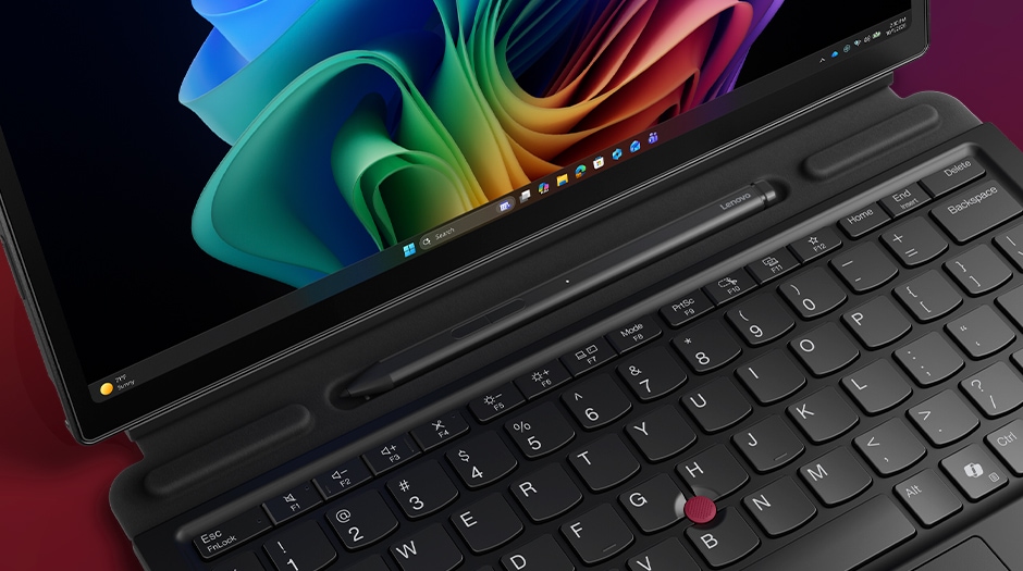 Angled closeup, highlighting keyboard, of the Lenovo ThinkPad X13 Detachable (13” Intel).