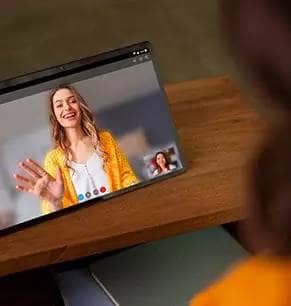 Lenovo tablet showing an online meeting on screen
