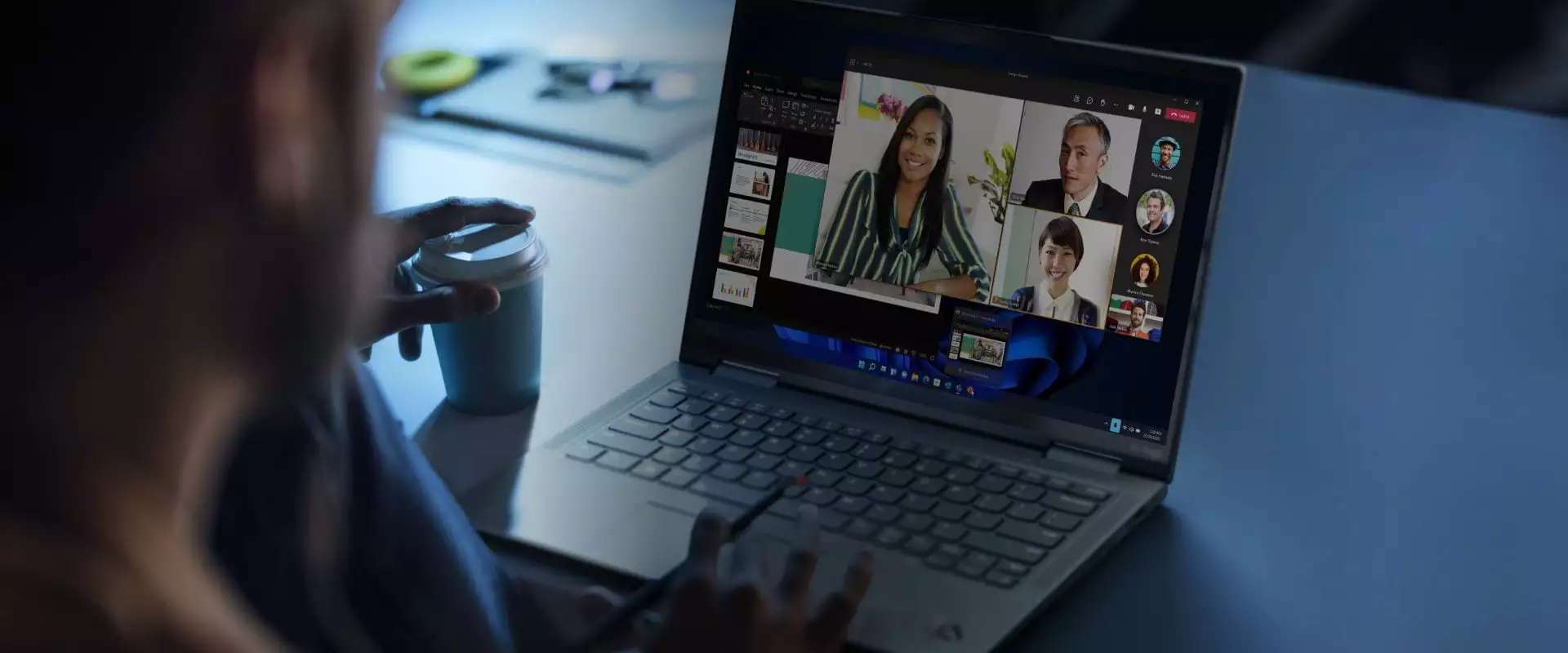 Person using Lenovo ThinkPad X1 Carbon Gen 10 laptop for videocall