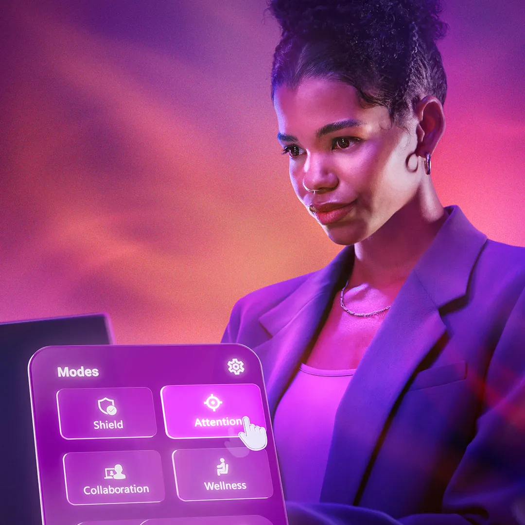 A woman working on a laptop using Smart Modes