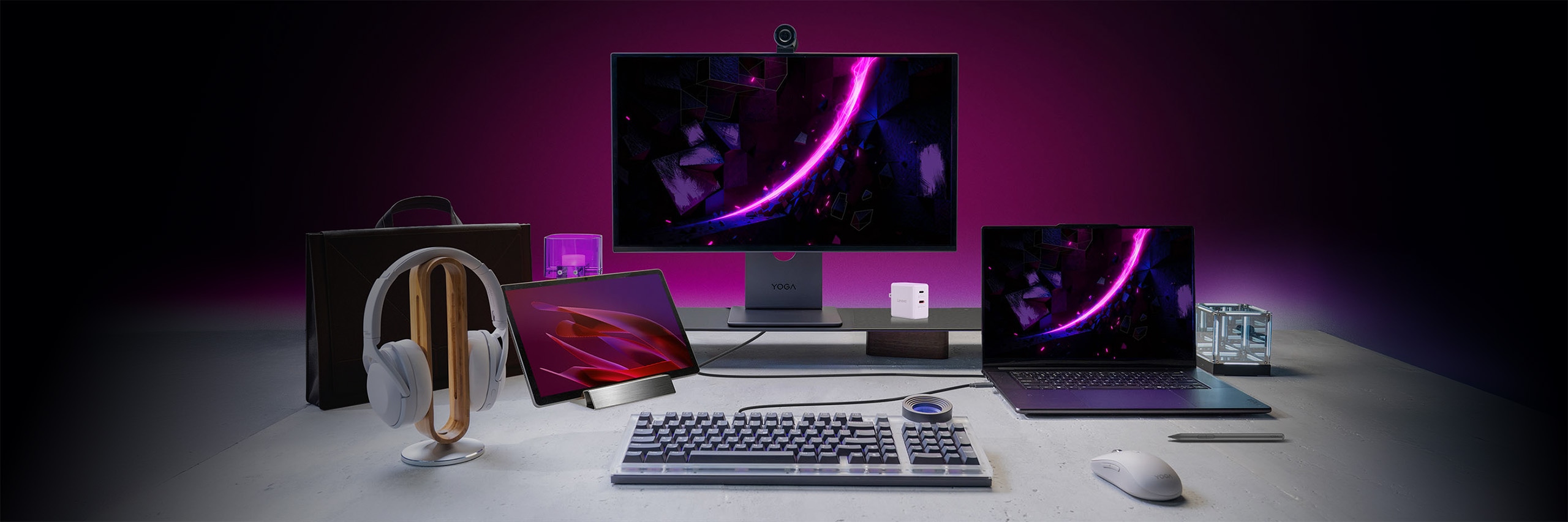 The full range of Yoga products, including a laptop, and all-in-one, a tablet, a keyboard, a mouse and more.