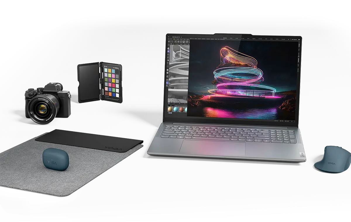 Un ordinateur portable Lenovo Yoga parmi une variété d’accessoires et d’appareils