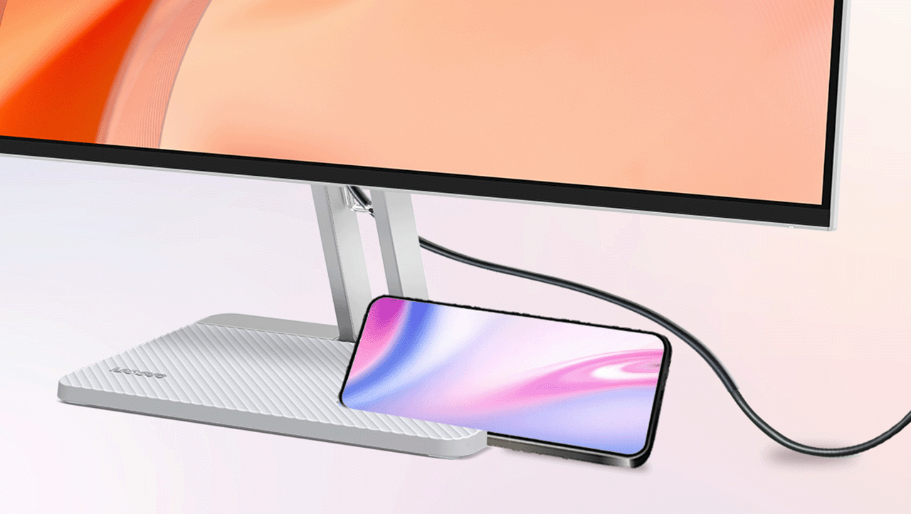 A close-up shot of the monitor showcasing its phone holder and integrated cable management.