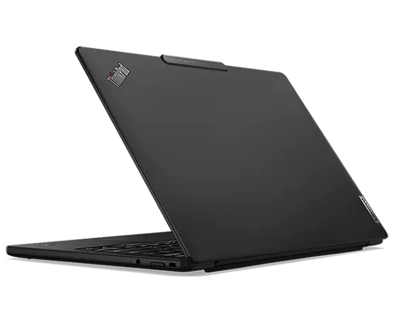 Rear-side of Lenovo ThinkPad X13s laptop open less  than 90 degrees and showing right-side ports.