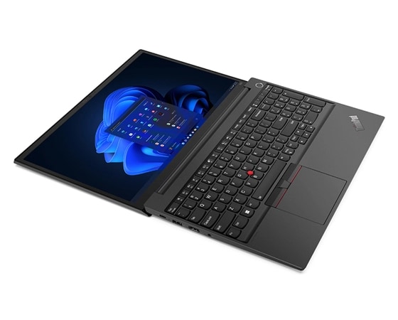 Aerial, left side view of Lenovo ThinkPad E15 Gen 4 (15” AMD) laptop, laid flat, opened 180 degrees, showing display and keyboard.
