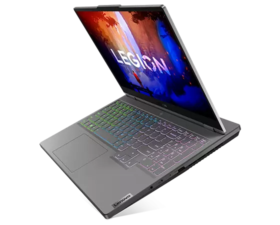 Legion 5 Gen 7 (15″ AMD) facing left, Windows 11 on screen and RGB keyboard lighting turned on.