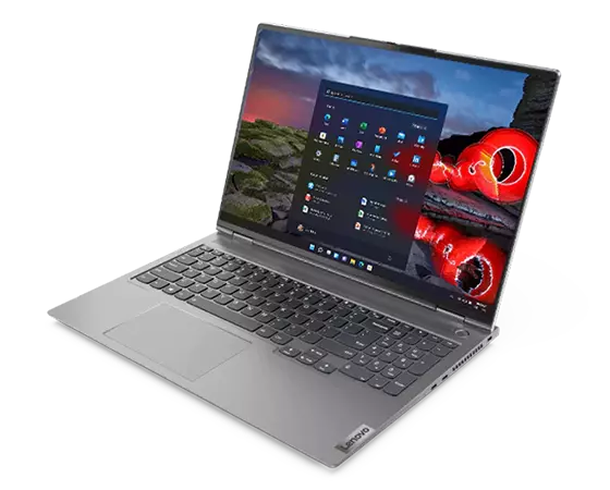 Lenovo ThinkBook 16p Gen 2 (16'' AMD) laptop – ¾ right-front view from slightly above, with lid open and image of dusk sky with concentric lines superimposed to emulate star patterns on the display