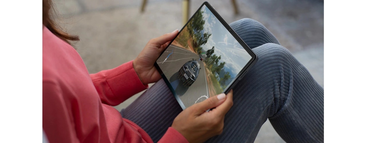 Front view of Lenovo Tab P11 tablet showing racing game