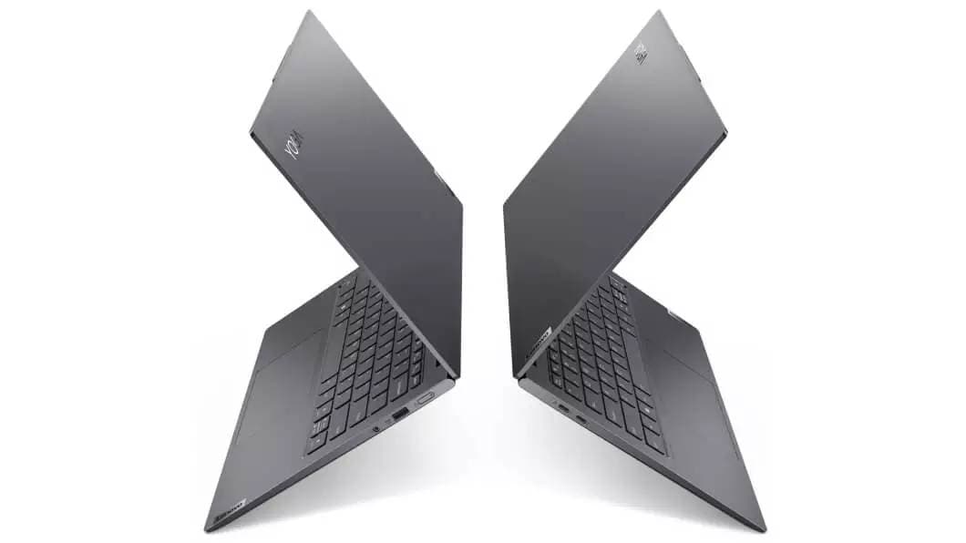 image of Two Lenovo Yoga Slim 7i Pro 14 slate grey laptops back to back, left and right profile view