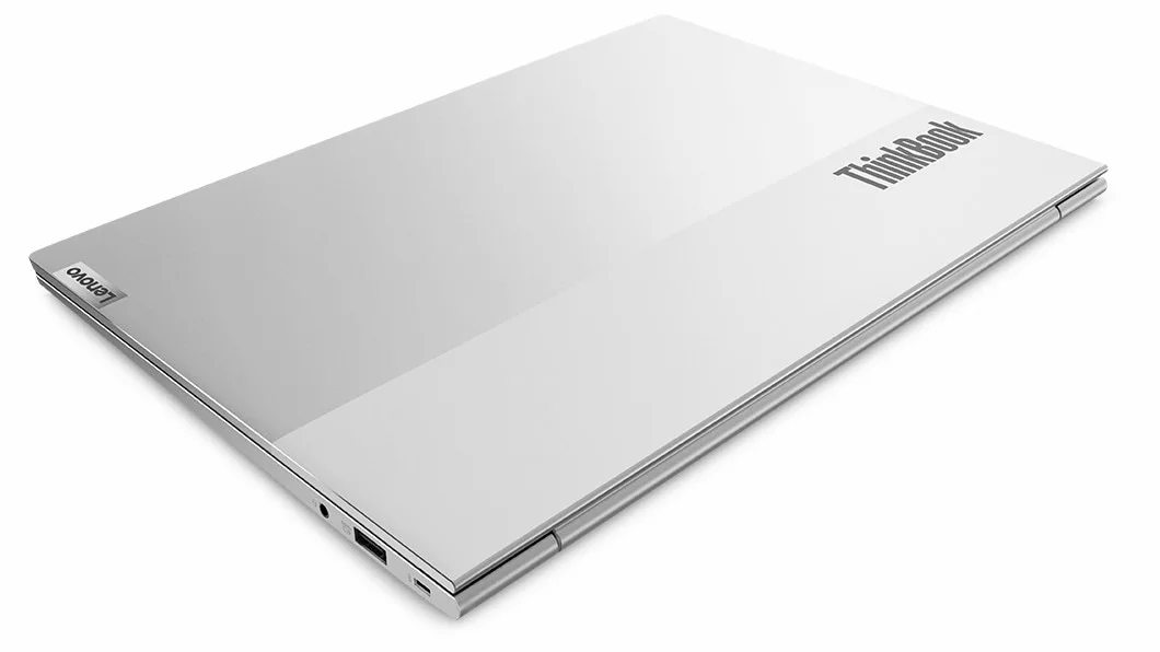 A dual-tone ThinkBook 13s Gen 4 (Intel) laptop viewed from the right-rear at a 30° angle with its top over closed, highlighting the distinctive ThinkBook logo and right-side ports.A dual-tone ThinkBook 13s Gen 4 (Intel) laptop viewed from the right-rear at a 30° angle with its top over closed, highlighting the distinctive ThinkBook logo and right-side ports.