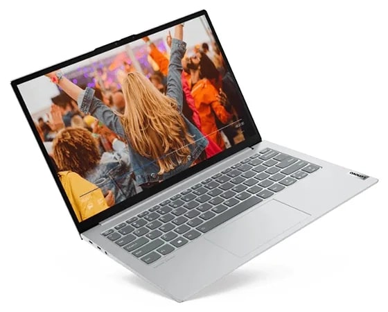 A Cloud Gray Lenovo ThinkBook 13x laptop viewed from front-left and floating as if held at an angle, open 110 degrees to show the keyboard and colorful 13.3'' display.