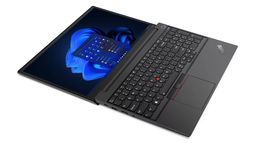 Aerial, left side view of Lenovo ThinkPad E15 Gen 4 (15, AMD) laptop, laid flat, opened 180 degrees, showing display and keyboard